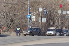 Nizhny Novgorod, Russia. - March 14.2017. Employees of the State Traffic Safety Inspectorate inspect cars in Lenin stock photo Nizhny Novgorod, Russia. - March 14.2017. Employees of the State Traffic Safety Inspectorate inspect cars in Lenin stock photo