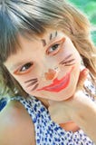 Niño feliz con la cara pintada divertida foto de archivo Niño feliz con la cara pintada divertida foto de archivo