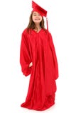 Niño orgulloso del graduado de la muchacha de la escuela foto de archivo libre de regalías Niño orgulloso del graduado de la muchacha de la escuela foto de archivo libre de regalías
