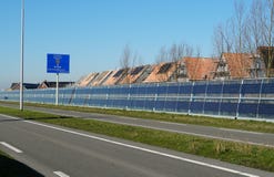 Noise barrier with integrated solar panels stock photos Noise barrier with integrated solar panels stock photos