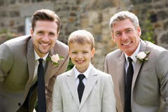 Noivo With Best Man e menino da página no casamento imagem de stock royalty free Noivo With Best Man e menino da página no casamento imagem de stock royalty free