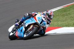 Noriyuki Haga #41 su BMW S1000 RR con il gruppo WSBK di Grillini DENTALMATIC SBK fotografia stock Noriyuki Haga #41 su BMW S1000 RR con il gruppo WSBK di Grillini DENTALMATIC SBK fotografia stock
