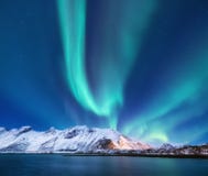 Northen Light Above Mountains In The Norway Stock Photo