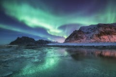 Northen Light Above Ocean And Mountains Stock Photography Northen Light Above Ocean And Mountains Stock Photography