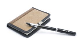 Notebook And Pen Pen Royalty Free Stock Photo