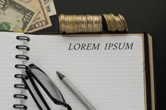 Notepad with Lorem ipsum words, pencil, glasses royalty free stock image Notepad with Lorem ipsum words, pencil, glasses royalty free stock image