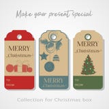 Noël étiquette, des autocollants, des insignes, des labels ou bannière pour votre boîte-cadeau sur le fond gris Illustration de v Photographie stock Noël étiquette, des autocollants, des insignes, des labels ou bannière pour votre boîte-cadeau sur le fond gris Illustration de v Photographie stock