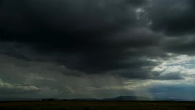 Nuages de Strom au-dessus de prairie, Okavango, Afrique méridionale photo stock Nuages de Strom au-dessus de prairie, Okavango, Afrique méridionale photo stock