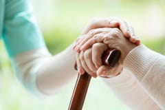 Nurse comforting elder lady stock photography Nurse comforting elder lady stock photography