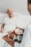 Nurse giving Lunch to Senior Patient in Hospital stock images Nurse giving Lunch to Senior Patient in Hospital stock images