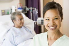 Nurse Standing In Patients Room Stock Photography Nurse Standing In Patients Room Stock Photography