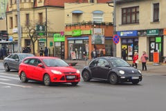 Ny VW skjuter ut på en gata arkivfoton Ny VW skjuter ut på en gata arkivfoton