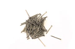 Nägel und Schrauben an einem weißen Hintergrund lizenzfreies stockfoto Nägel und Schrauben an einem weißen Hintergrund lizenzfreies stockfoto