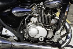 Närbild av en motorcykelmotor fotografering för bildbyråer Närbild av en motorcykelmotor fotografering för bildbyråer