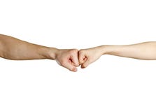 Näve till nävemannen vs den kvinnliga handen Isolerat på en vit backgroun royaltyfri foto Näve till nävemannen vs den kvinnliga handen Isolerat på en vit backgroun royaltyfri foto