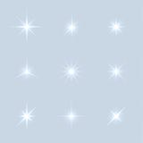 O grupo do vetor de faísca ilumina estrelas ilustração stock O grupo do vetor de faísca ilumina estrelas ilustração stock