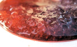 O vermelho e o roxo ooze imagem de stock O vermelho e o roxo ooze imagem de stock