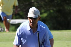 Obama playing golf Hawaii