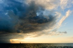 Ocean Sunset Sailboat Storm Stock Photography