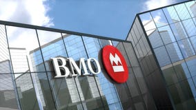 Editorial, Bank of Montreal logo on glass building.