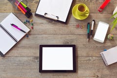 Office desk mock up template with table, smart phone, notebook and cup of coffee. View from above with copy space stock photography Office desk mock up template with table, smart phone, notebook and cup of coffee. View from above with copy space stock photography