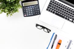 Office desk table with laptop, office supplies top view royalty free stock photos Office desk table with laptop, office supplies top view royalty free stock photos
