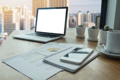 Office table with laptop blank screen computer building background stock image Office table with laptop blank screen computer building background stock image
