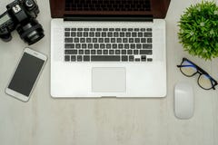Workplace with notebook laptop Comfortable work table in office royalty free stock images Workplace with notebook laptop Comfortable work table in office royalty free stock images