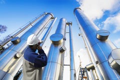 Oil worker with oil and gas pipes Stock Photography Oil worker with oil and gas pipes Stock Photography