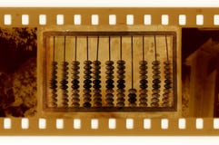 Old 35mm frame photo with vintage abacus royalty free stock photo Old 35mm frame photo with vintage abacus royalty free stock photo