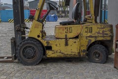 An old abandoned forklift at the sea station in Varna stock photos An old abandoned forklift at the sea station in Varna stock photos