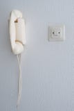 Old analogue telephone on a wall stock photos Old analogue telephone on a wall stock photos