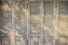 Old ancient wooden swing door background. Vintage of old wooden Royalty Free Stock Images Old ancient wooden swing door background. Vintage of old wooden Royalty Free Stock Images