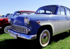 Old blue cars on the streets of Kiev against the blue sky stock image Old blue cars on the streets of Kiev against the blue sky stock image