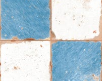 Old blue and white ceramic tiles with peeling paint stock photos Old blue and white ceramic tiles with peeling paint stock photos