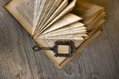 Old Book And Mirror Stock Photo Old Book And Mirror Stock Photo