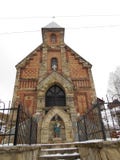 Old catholic church in the village. brick front door stock photo Old catholic church in the village. brick front door stock photo