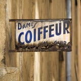 Old Coiffeur Sign In France Stock Photo