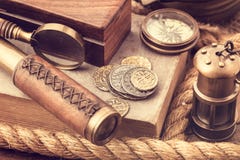 Old Coins And Nautical Accessories Royalty Free Stock Photo