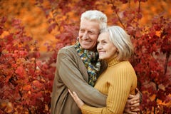 Old Couple At Autumn Park Stock Images