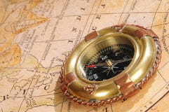 Old-fashioned Compass On An Old Map Royalty Free Stock Image