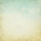 Old grunge background with blue sky white clouds