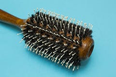An old hairbrush with dropped hair, hygiene royalty free stock image An old hairbrush with dropped hair, hygiene royalty free stock image