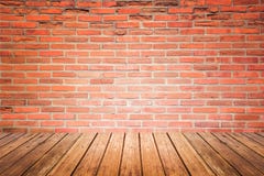Old interior room with brick wall and wood floor Stock Image Old interior room with brick wall and wood floor Stock Image