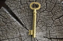 Old Key Of Gold Colour. Royalty Free Stock Photography