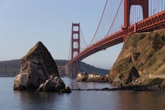 Old lighthouse and fog station under Golden Gate bridge in sunri royalty free stock photos Old lighthouse and fog station under Golden Gate bridge in sunri royalty free stock photos
