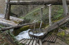 Old operative workshop with fulling mill or tepavitza for washing of wool weaves with water in the Etar Stock Images Old operative workshop with fulling mill or tepavitza for washing of wool weaves with water in the Etar Stock Images