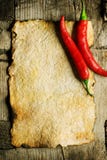 Old Paper And Chili Peppers Royalty Free Stock Photography Old Paper And Chili Peppers Royalty Free Stock Photography
