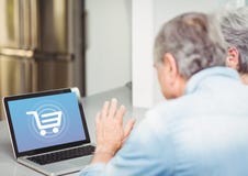 Old people using laptop with Shopping trolley icon stock image Old people using laptop with Shopping trolley icon stock image