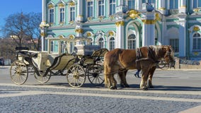 Old Retro Carriage in Front of Winter Palace Hermitage Museum on Palace Square in St. Petersburg, Russia. Historical Old- royalty free stock photo Old Retro Carriage in Front of Winter Palace Hermitage Museum on Palace Square in St. Petersburg, Russia. Historical Old- royalty free stock photo